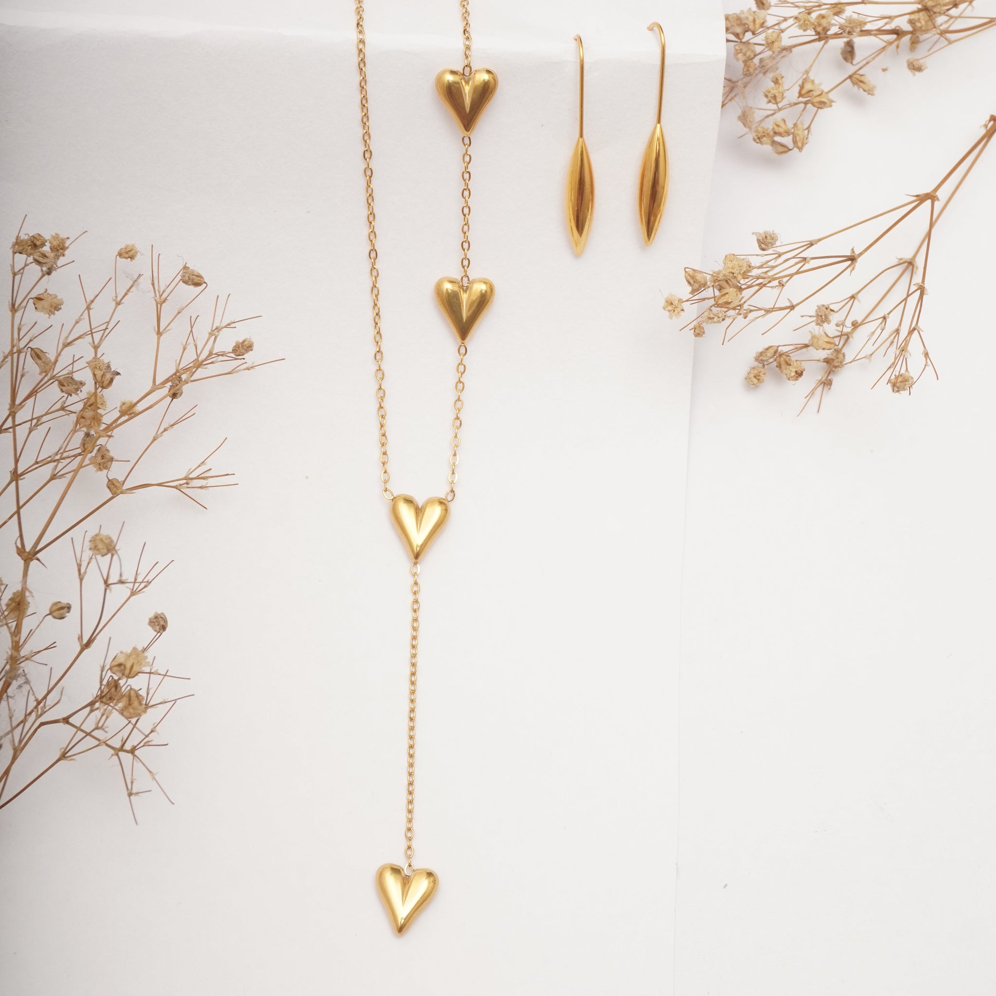 Willow Arc Earrings and Cascade of Love pendant set