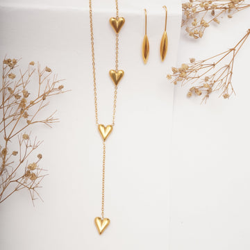 Willow Arc Earrings and Cascade of Love pendant set