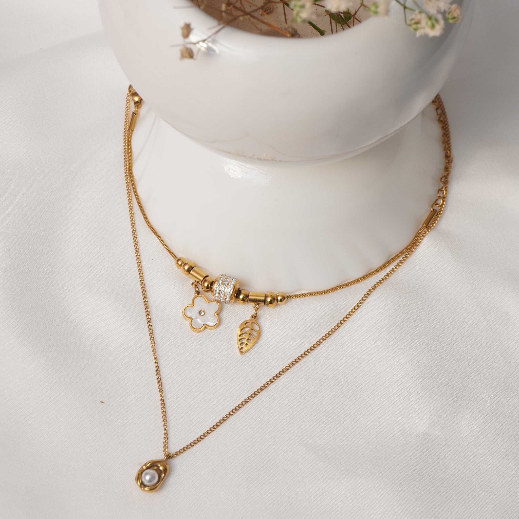 Classic Pearl Halo Pendant and Petal Gleam Bracelet Set
