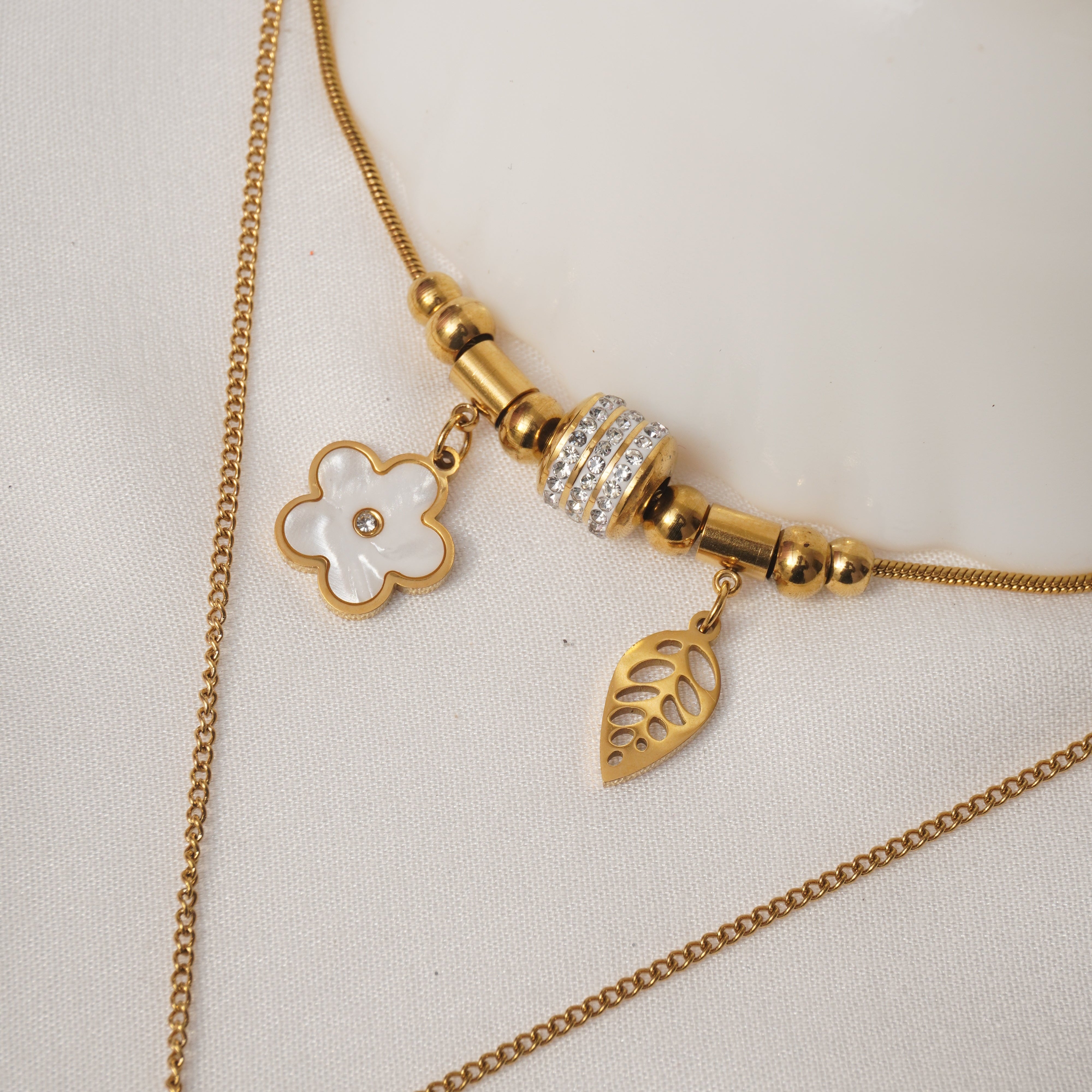 Classic Pearl Halo Pendant and Petal Gleam Bracelet Set